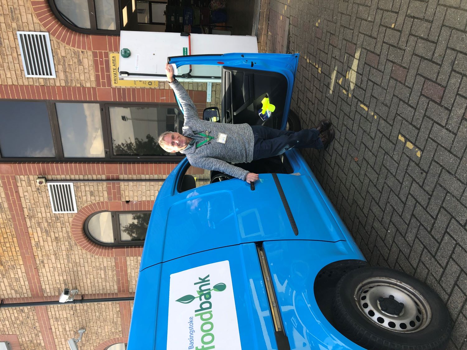 Our foodbank van and Geoff, store manager