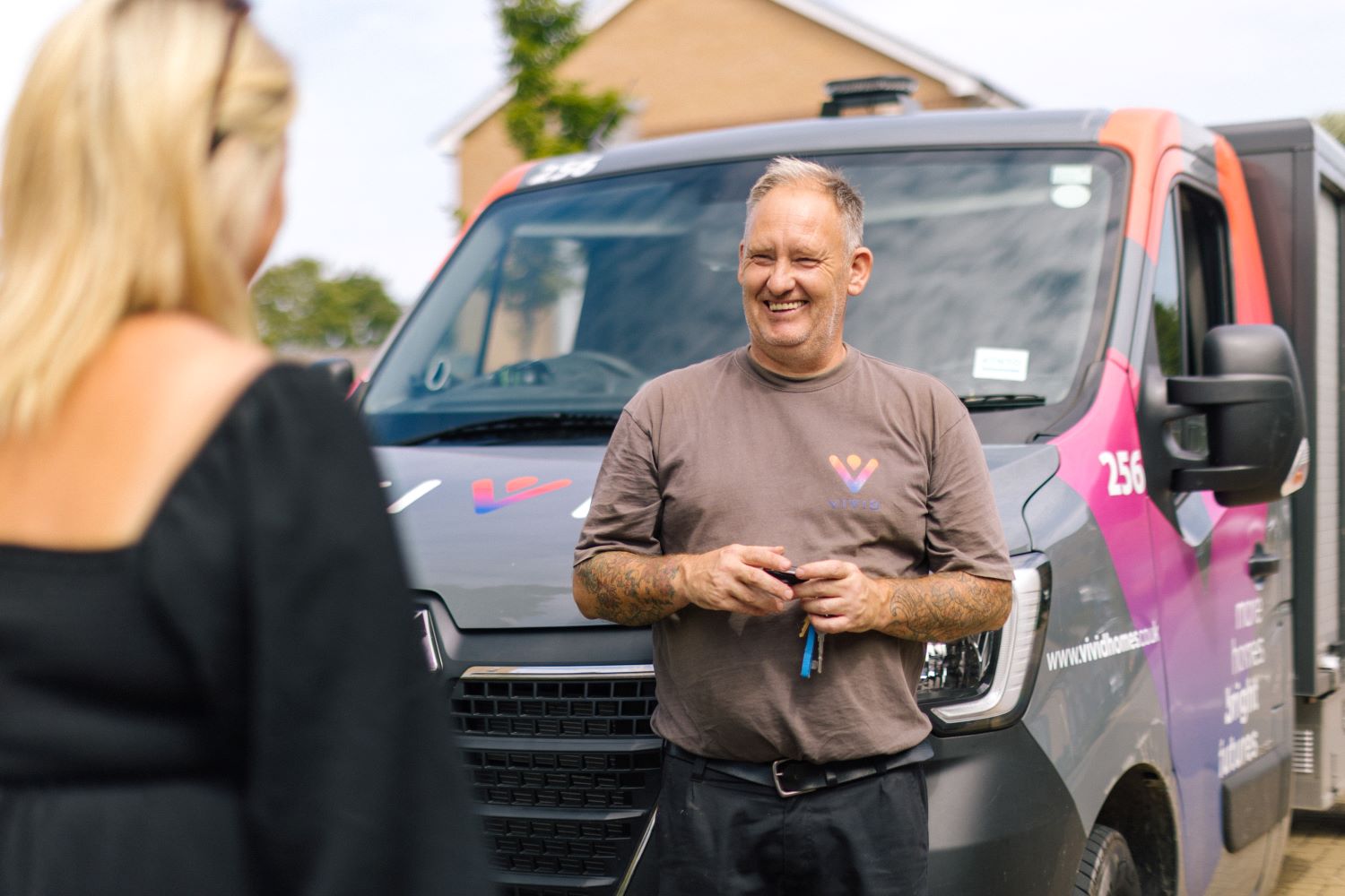 Staff talking to customer